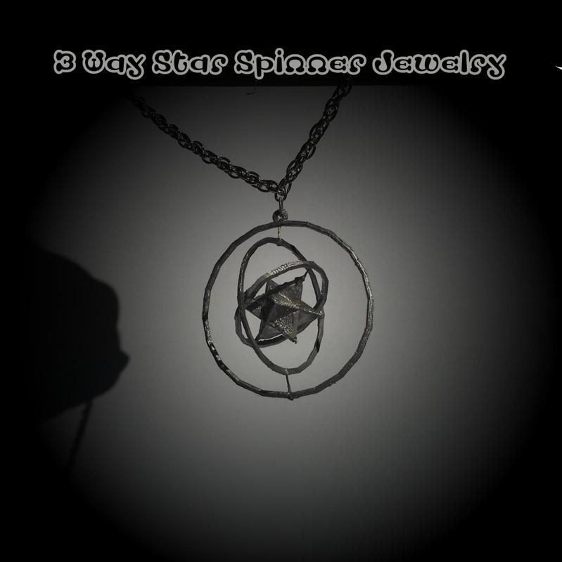 Triple spin star pendant. Fidget spinner jewellery.