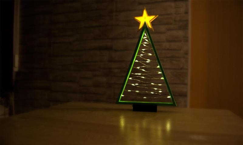 lighted christmas tree with lighted star