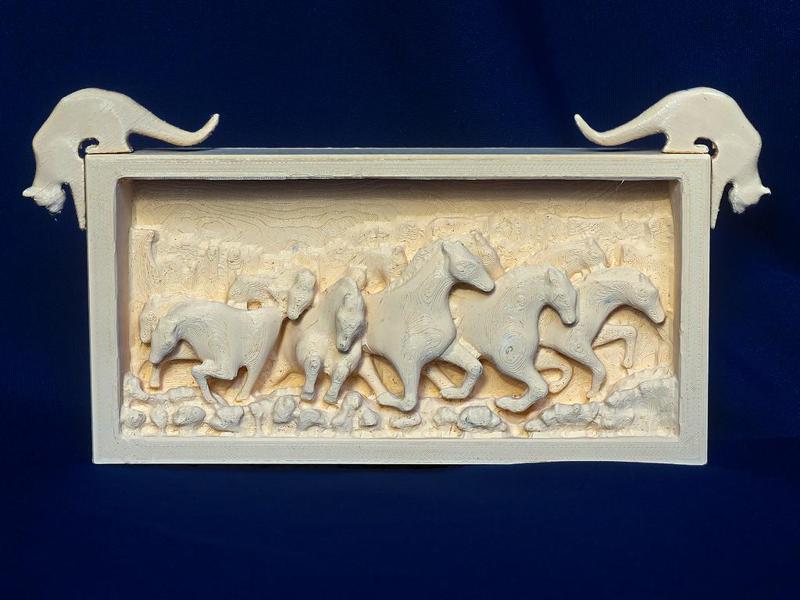 Jean Gordon's carvings The Stampede and Corner Cats