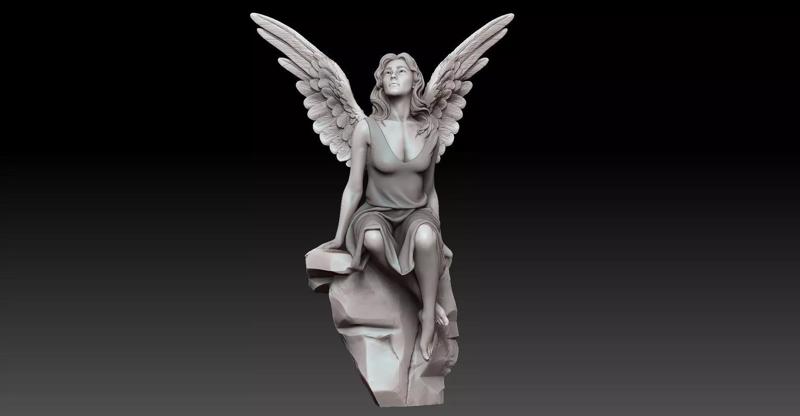 beautiful angel siting on the rock