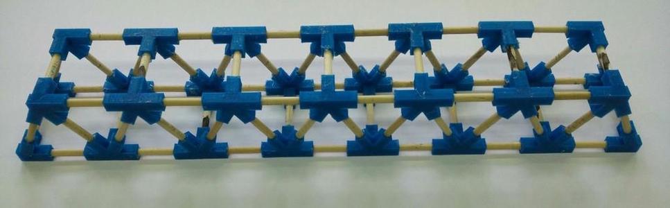 Bridge with plastic joints and wood rods