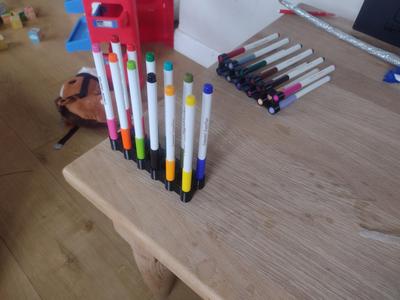 Pen holder/lid saver