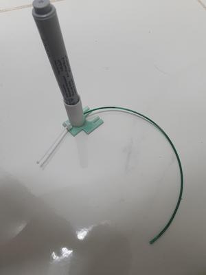 Filament guide and pen holdet