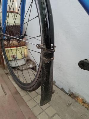 Bike mud flap holder