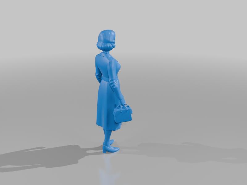 1930s woman carrying a bag - ok for OO railways
