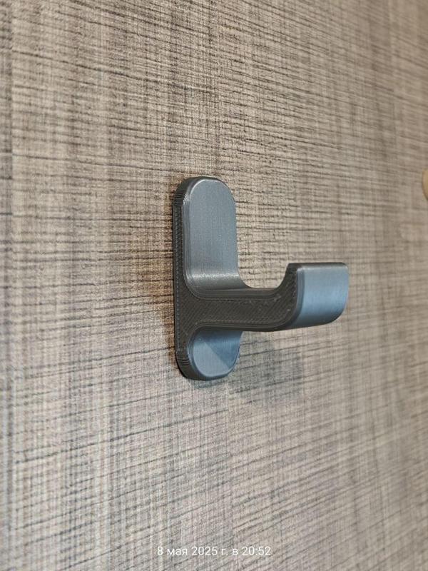 Hook for headphones or other things.