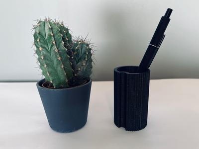 C-shaped pen holder
