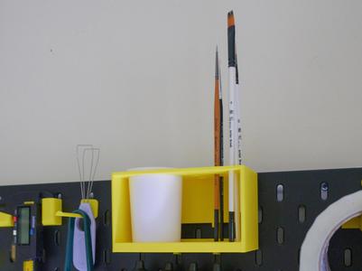 Skadis brush storage with cup