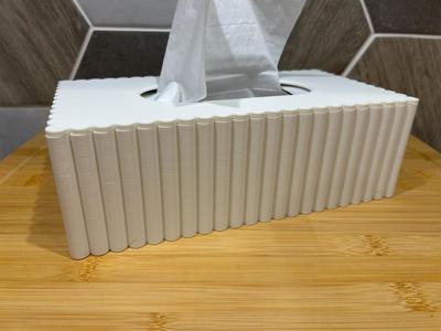 Tissue box with magnets