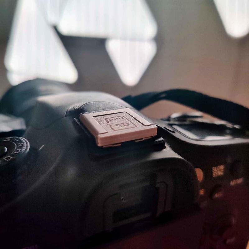 Hot Shoe cover with hidden SD card storage