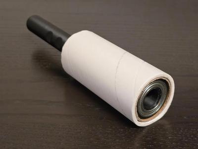 Lint roller with bearings and with storage container   