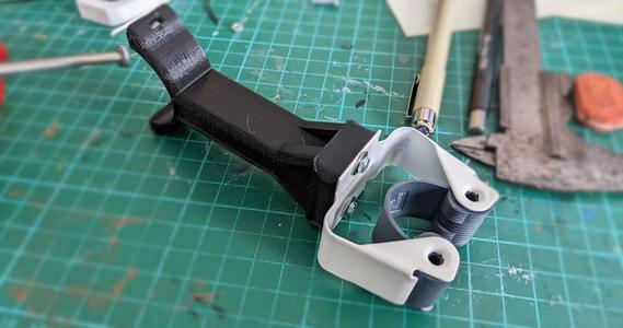 Handle holder with tube attachment