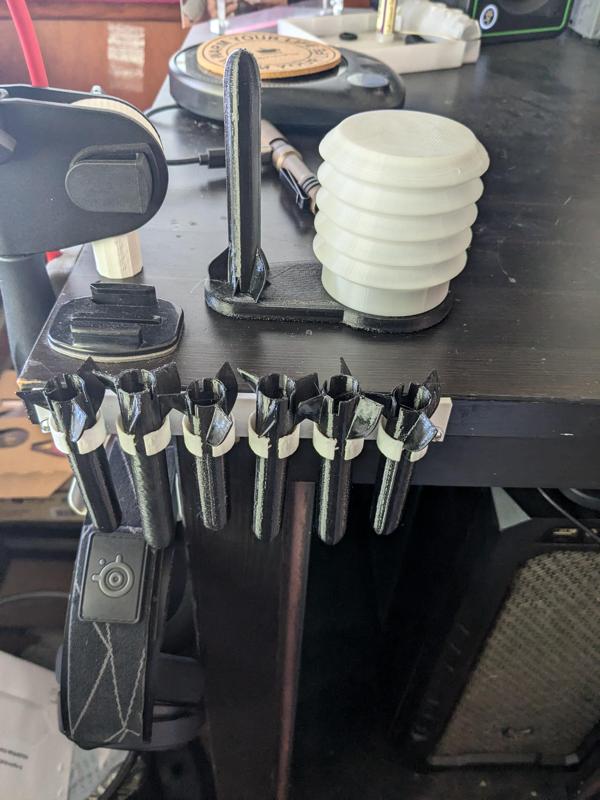 Mountable clip for spare rockets for stompin whomp rocket