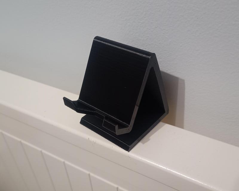 Phone stand with charger cutout (filled)