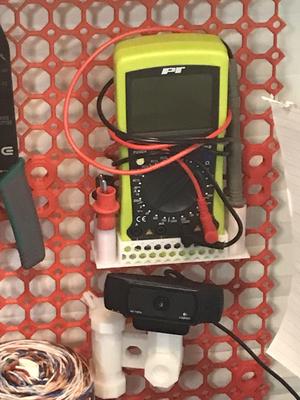 Multimeter holder for multiboard