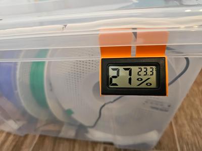 Hygrometer holder for drybox
