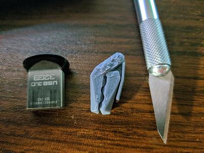 30% Size Cam Clip Using 1.75mm Filament Pieces as Hinge EXPERIMENTAL