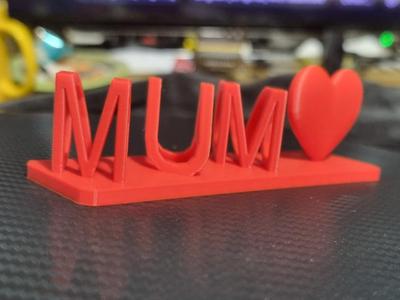 Mum and dad ilusion text with heart figure