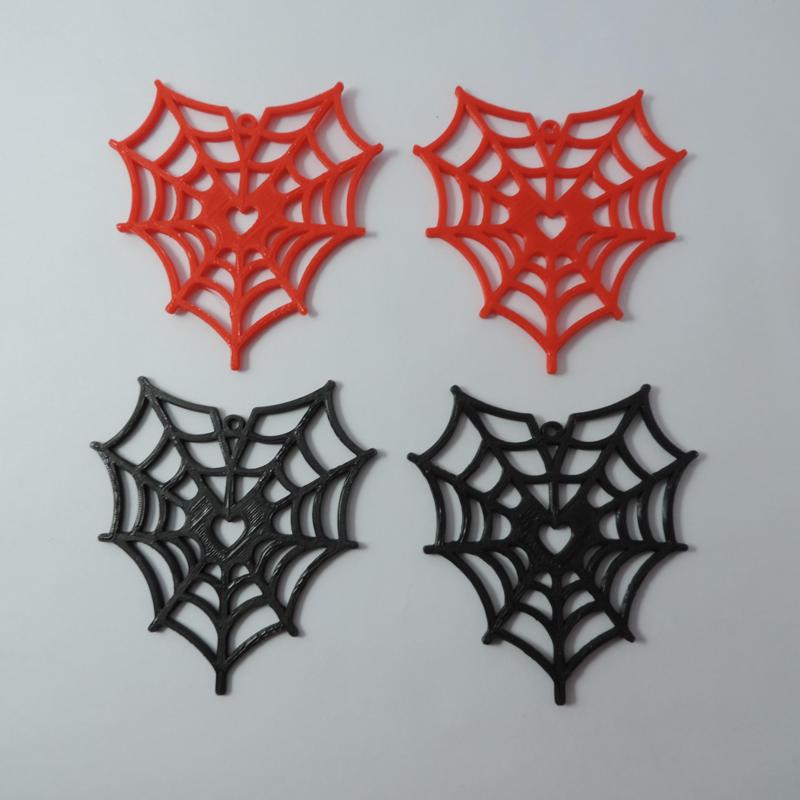 Spider web heart earrings