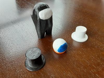 Among Us figurines w/ hats.