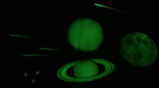 Glowing night sky and planets