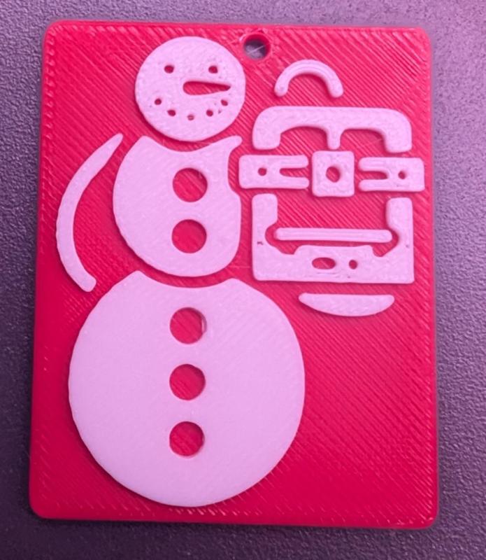 Snowman holding 3D printer