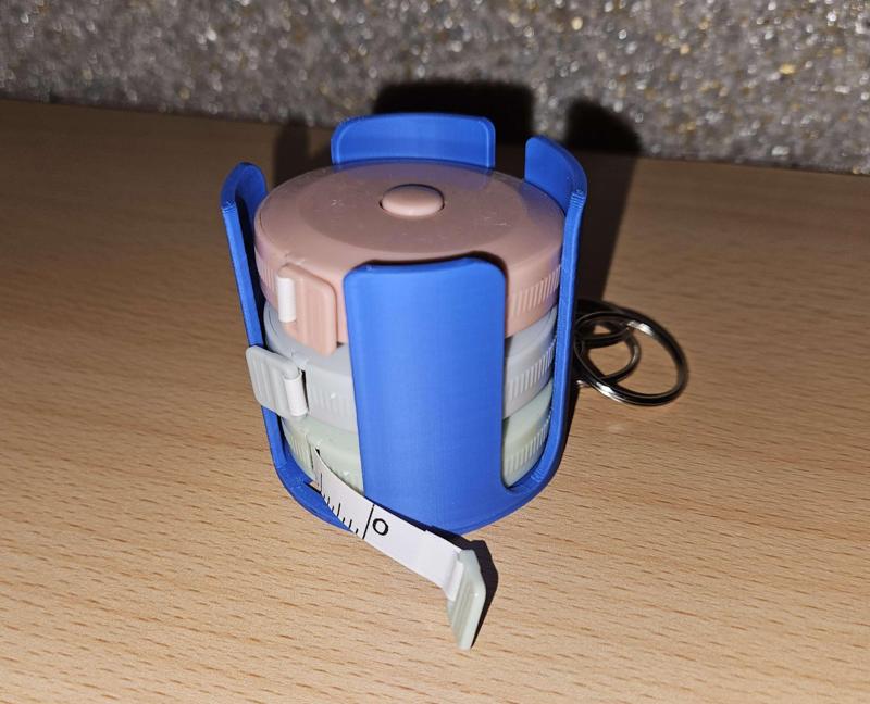 Tailor's tape measure holder