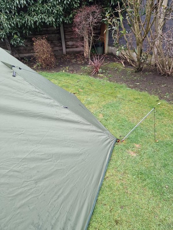 Tent pole guy wire stand off reuse.