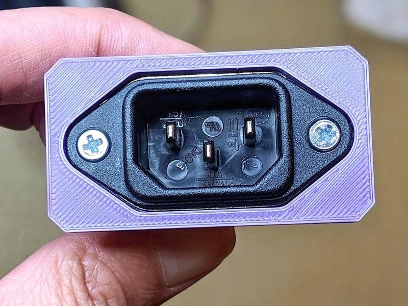 Cover for C14 noise filter