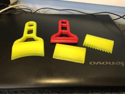 Printer bed scraper re-usable.