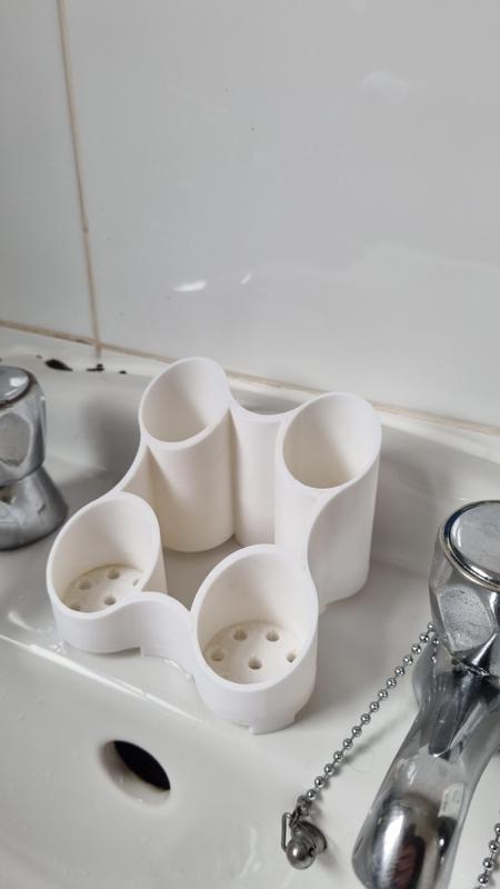 Electric toothbrush and paste holder