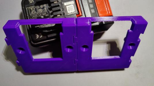 Einhell robust wall battery holder