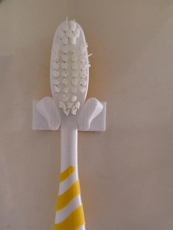 Very small toothbrush holder