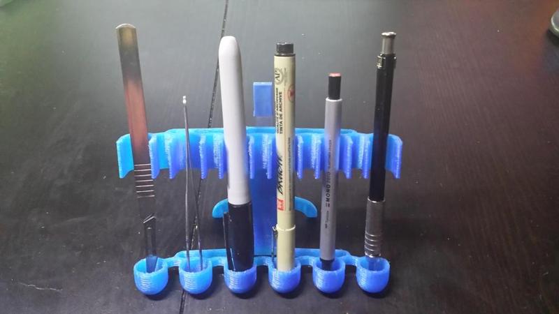 Semi-erect Pen Holder