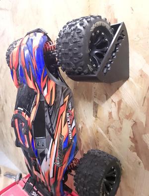 Wall mounting bracket for RC TT 1/10 Traxxas Rustler or other For wheel diameter approx. 120 mm ( development kit for other diameters possible ) Consists of two brackets / screw fixing diameter 3 mm or other ( wheel diameter approx. 120 mm )