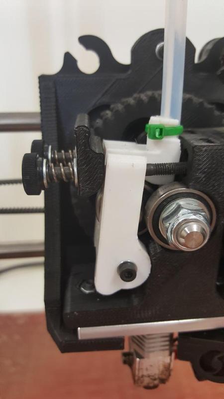 Taz 5 Extruder idler block with added tube holder