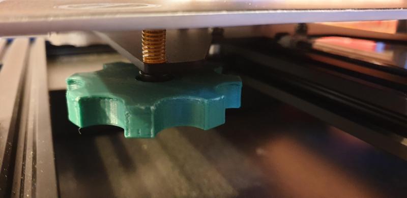 Alfawise U50 bed levelling wheel