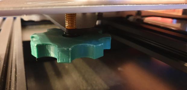 Alfawise U50 bed levelling wheel