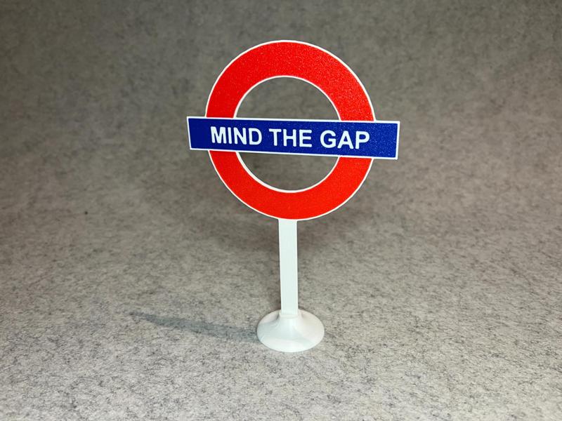 Mind the gap London Underground sign stand