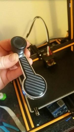 Datsun window crank cover