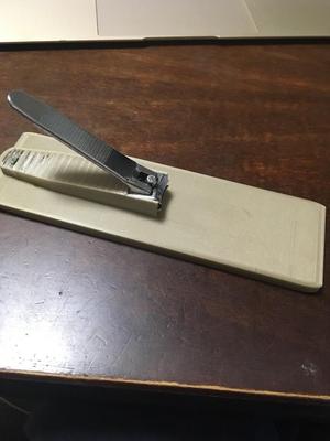 Nail cutter base