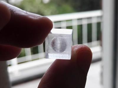Mini transparent printing test cube with embedded sphere