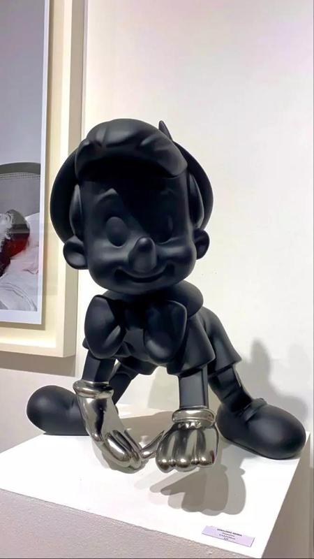 Chrome Pinocchio Disney Cricket Player toy