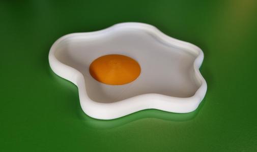 Egg-shaped jewelry/candy bowl