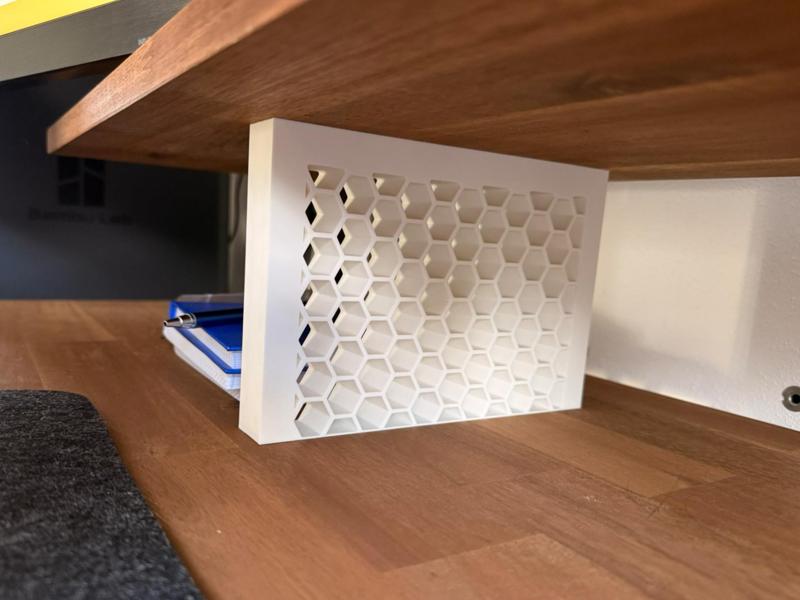 Spacer with hexagon pattern for a Desk Shelf