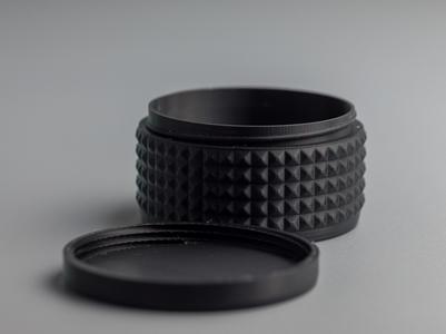 Round box with screw cap.