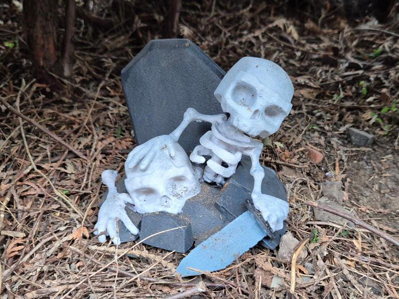 Halloween – a skeleton crawling out of its grave