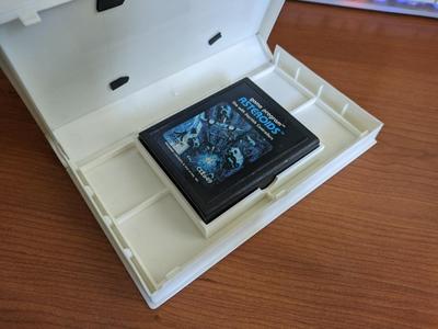 Atari 2600 cartridge holder for VHS clamshell case