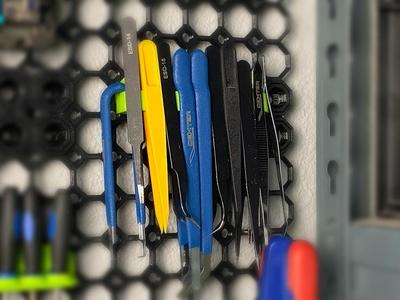 Organizador de pinzas para tablero múltiple