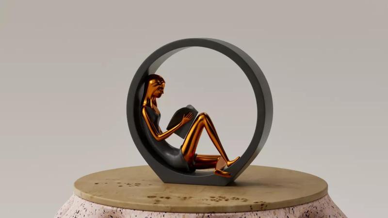 ESCULTURA - MUJER LEYENDO